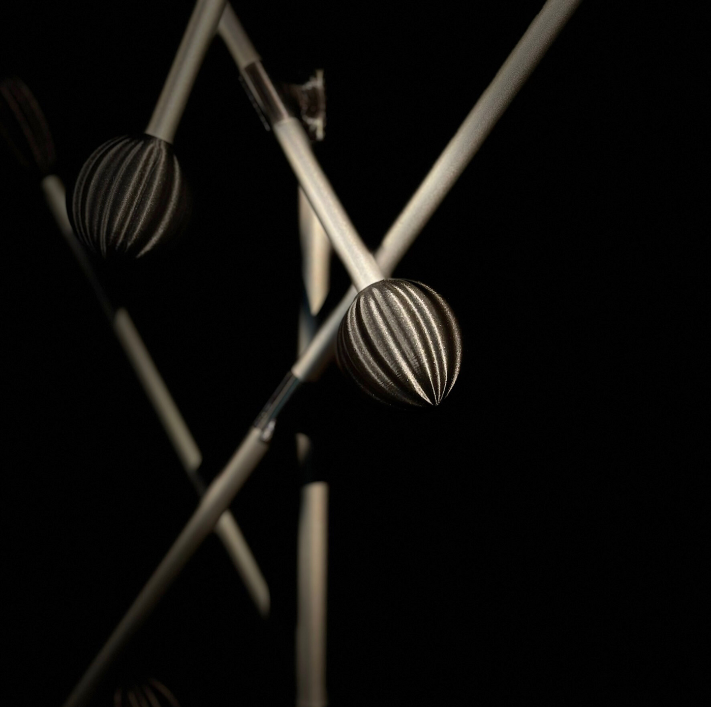 Aluminium bar with black chrisnas ornament ball