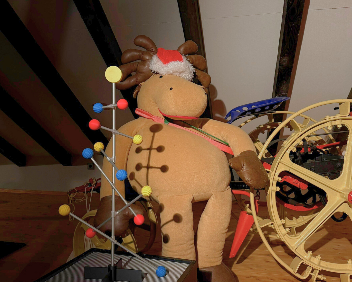 Christmas decorative room in Bauhaus color. And a Bauhaus colored Christmas tree stand on the coffee table