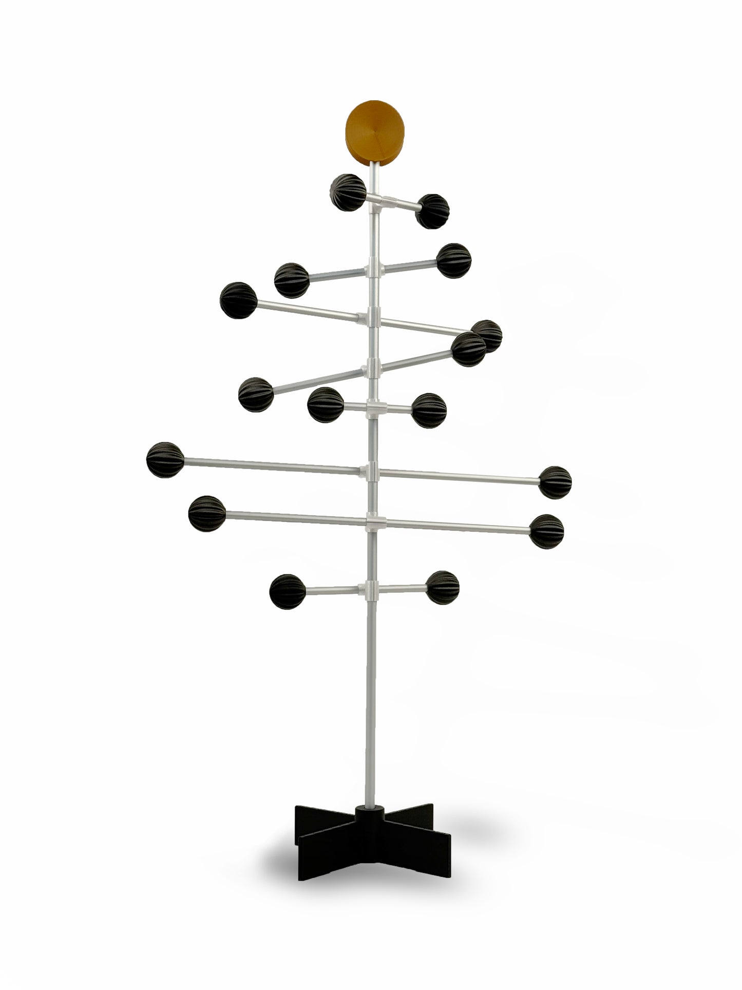 Modern metal rack with black balls and a brown sphere toppers design on a white background