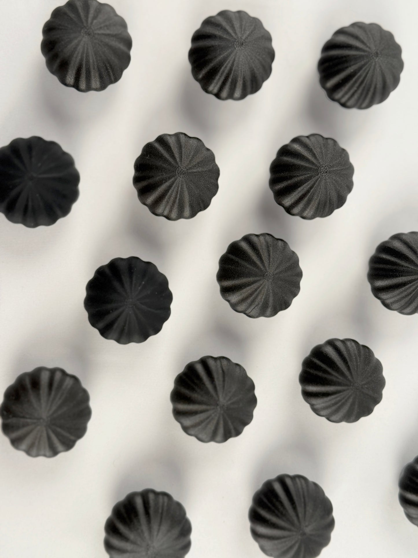 Black spherical shaped Christmas ornament