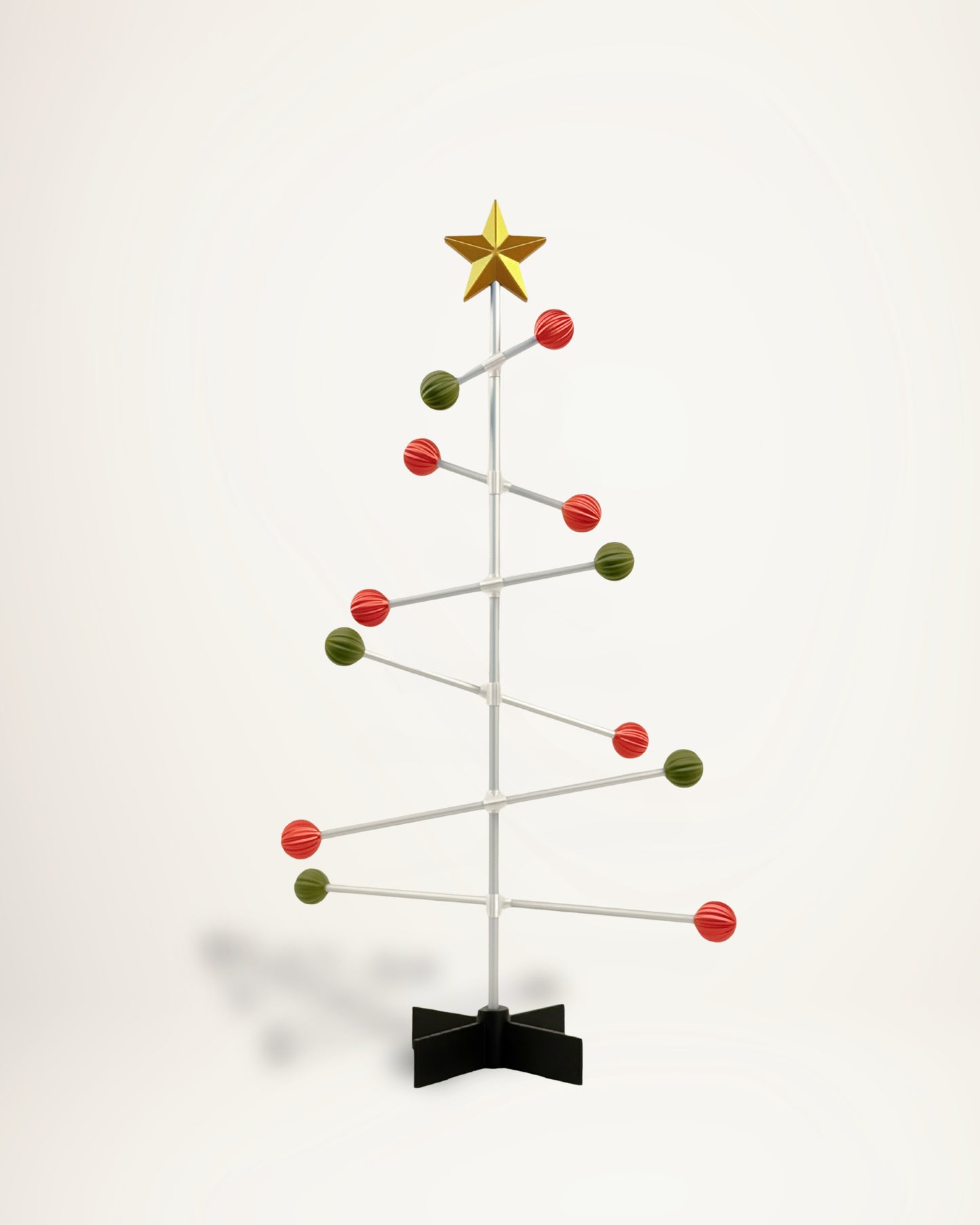 DESY Tree – Moderner modularer Weihnachtsbaum mit grünen und roten Kugeln und einem goldenen Stern.