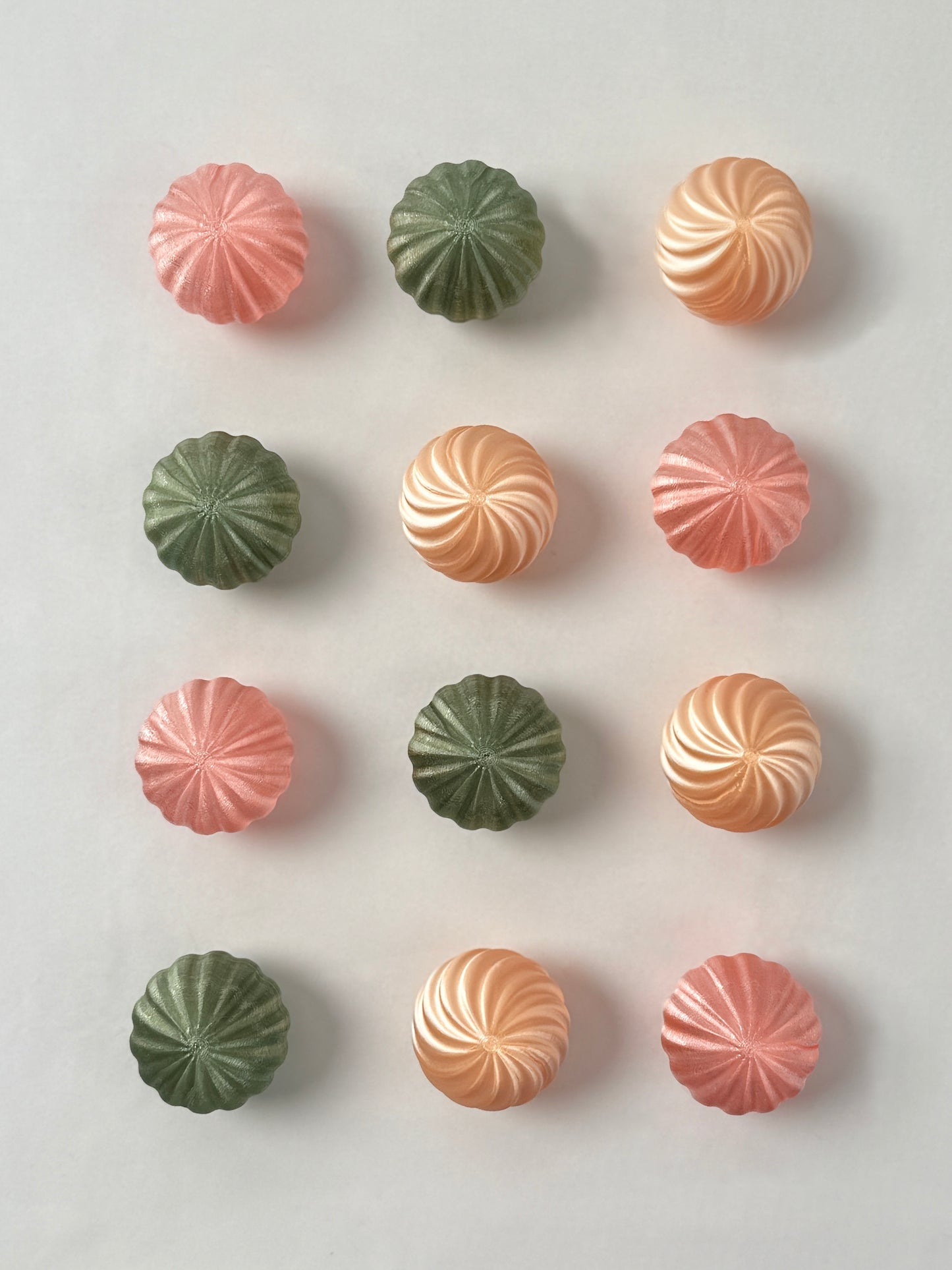 Pastel-spring colored spherical shaped Christmas ornament