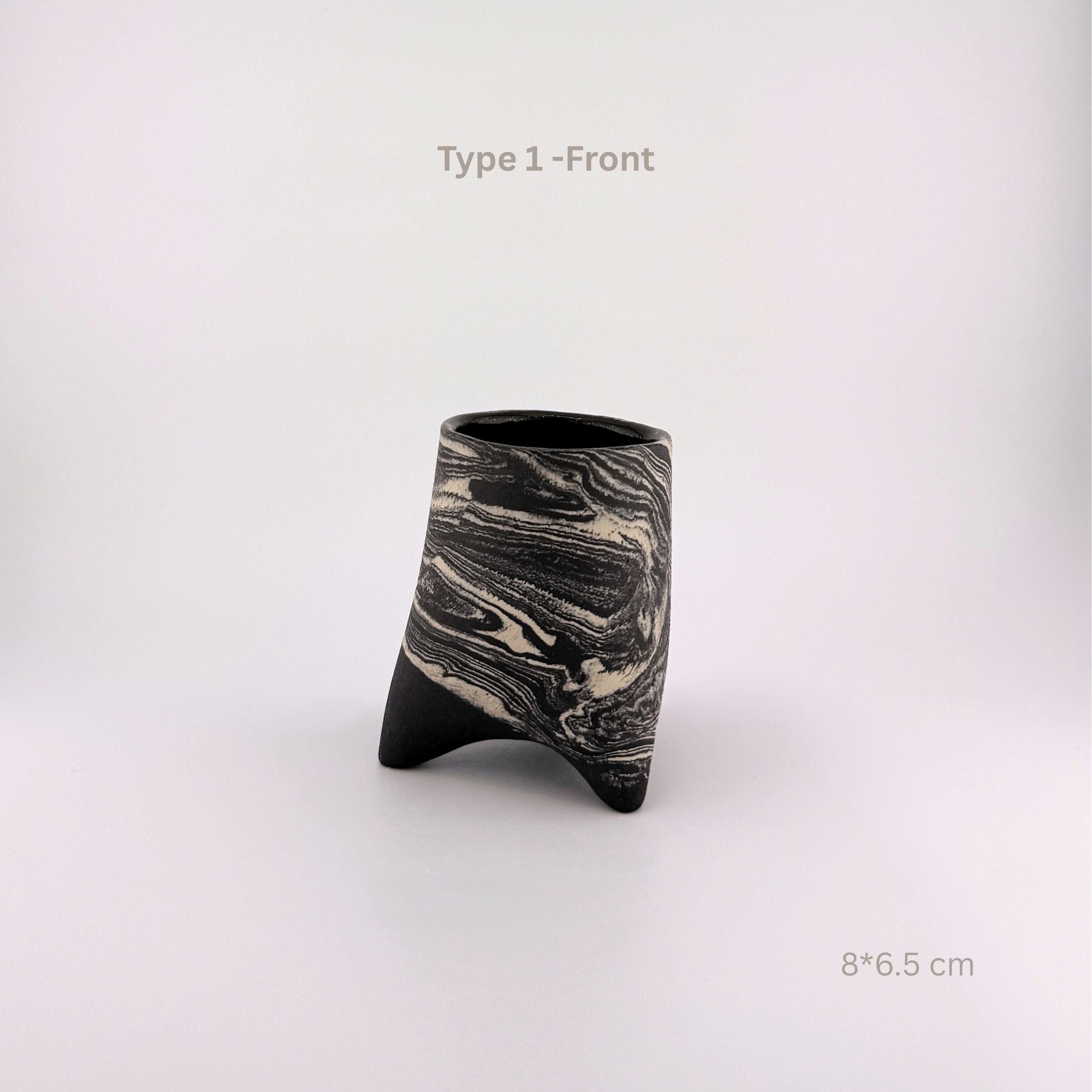 A modern sculptural ceramic vase with a black and white marbled pattern and a three-pronged base, shown on a light gray background with text overlays 'Type 1 -Front' and '8*6.5 cm'.