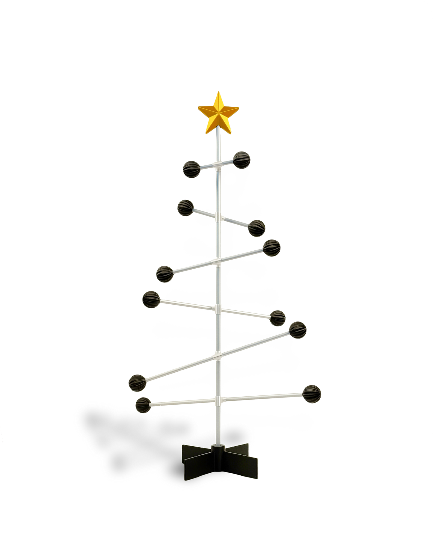 DESY Tree - Modern modular Christmas tree with black spheres and a gold star .