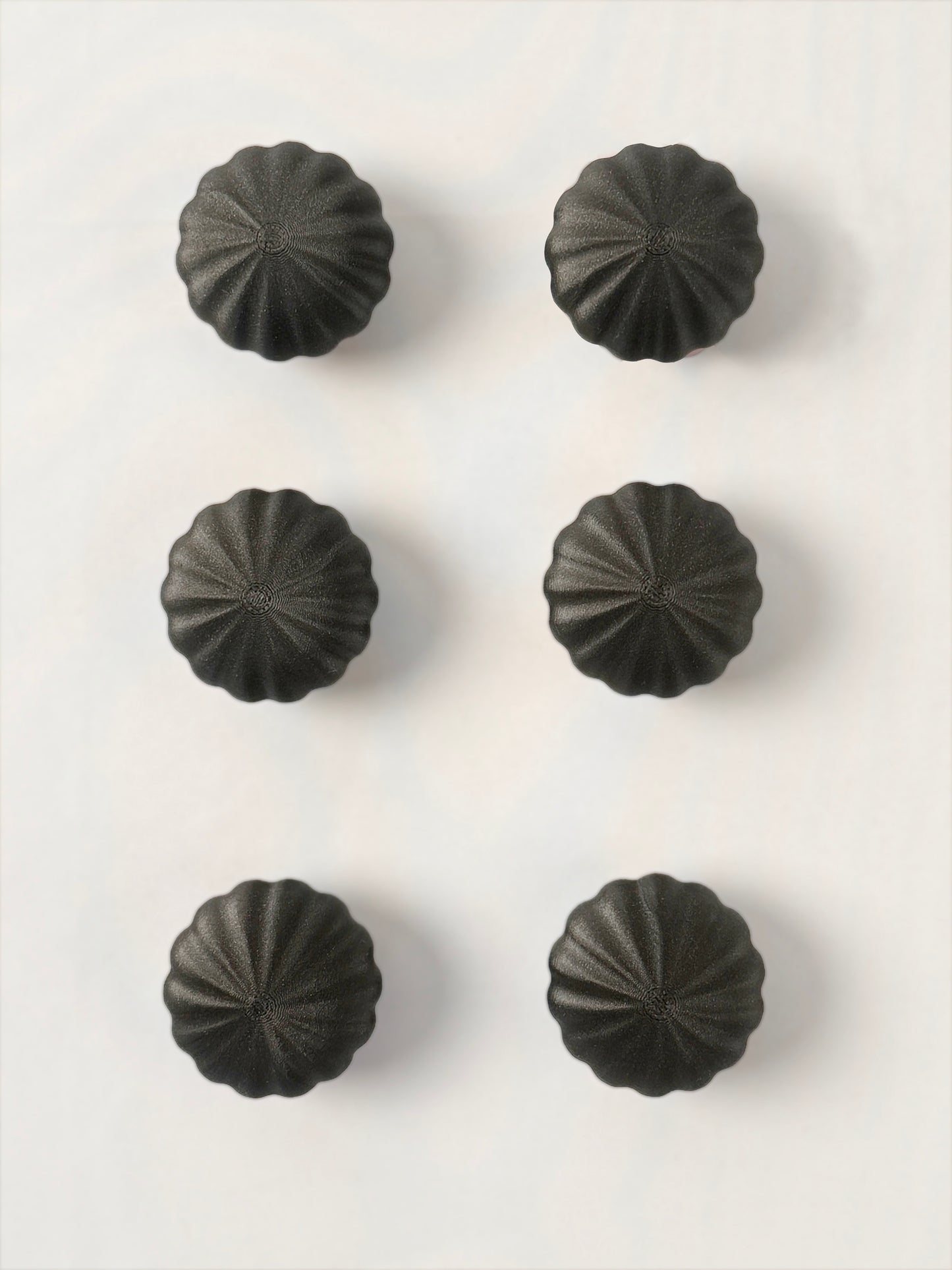 Black spherical shaped Christmas ornament 