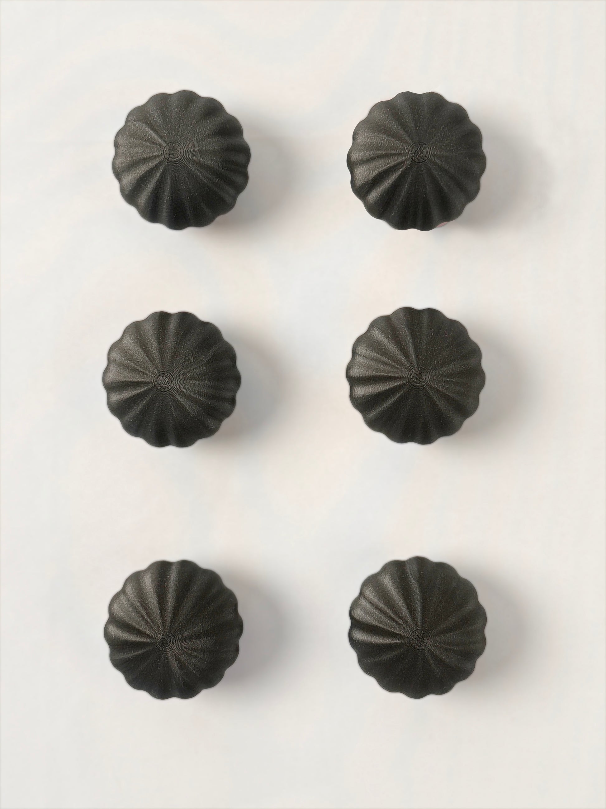 Black spherical shaped Christmas ornament 