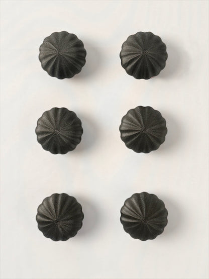 Black spherical shaped Christmas ornament 