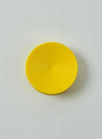 3D print Yellow circular object on a white background
