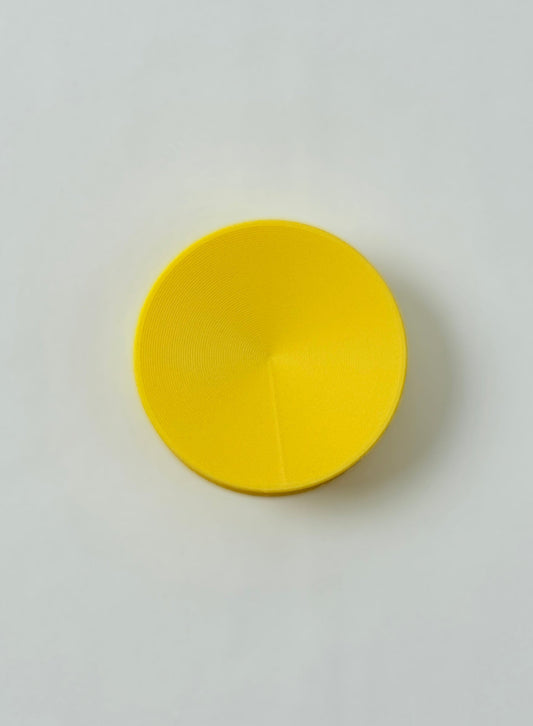 3D print Yellow circular object on a white background