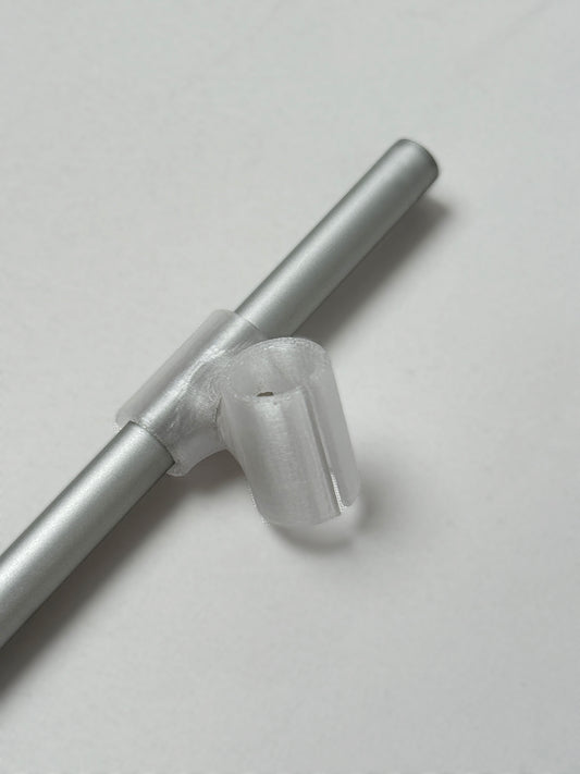 Metal rode with 3D print connector on a light gray background