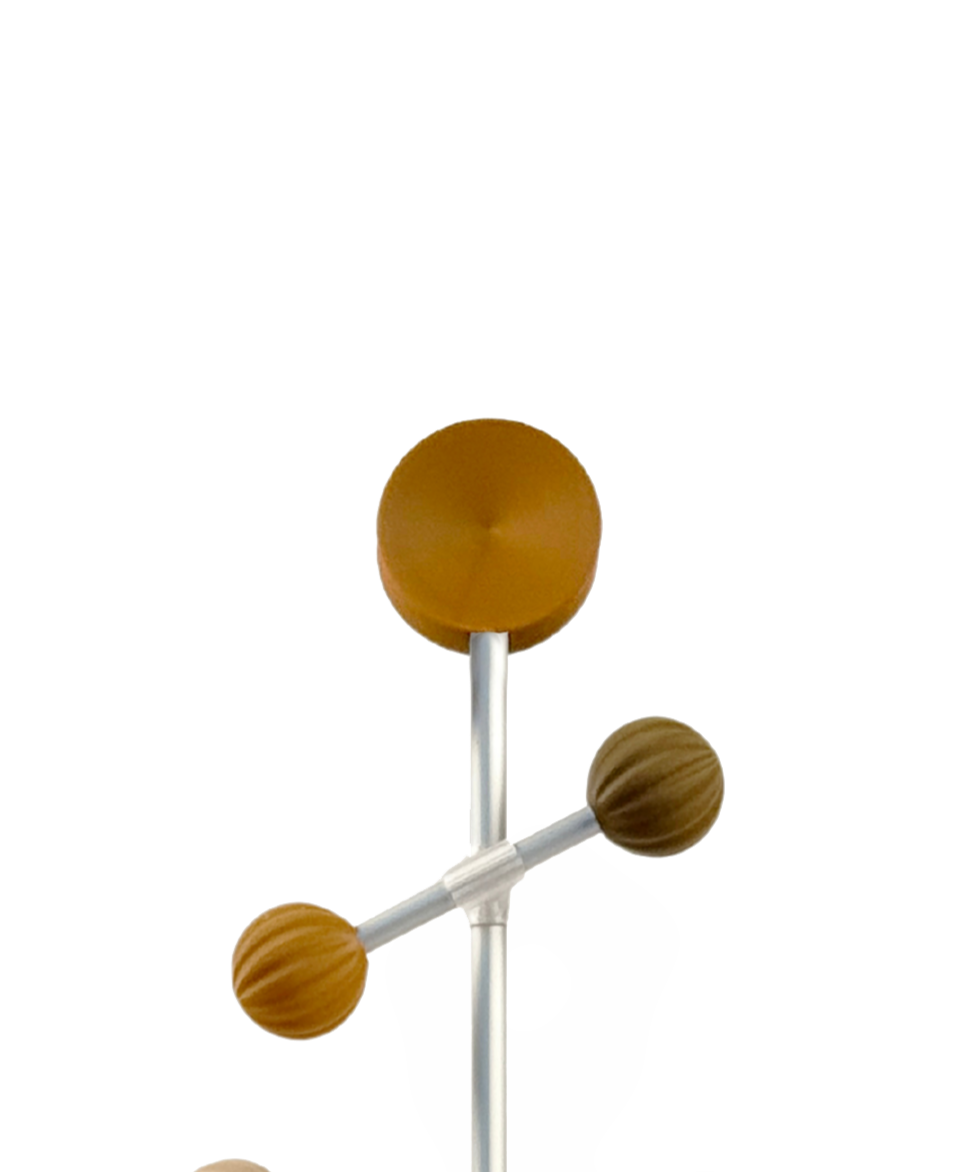 Modern brown round ornaments on a aluminum bar