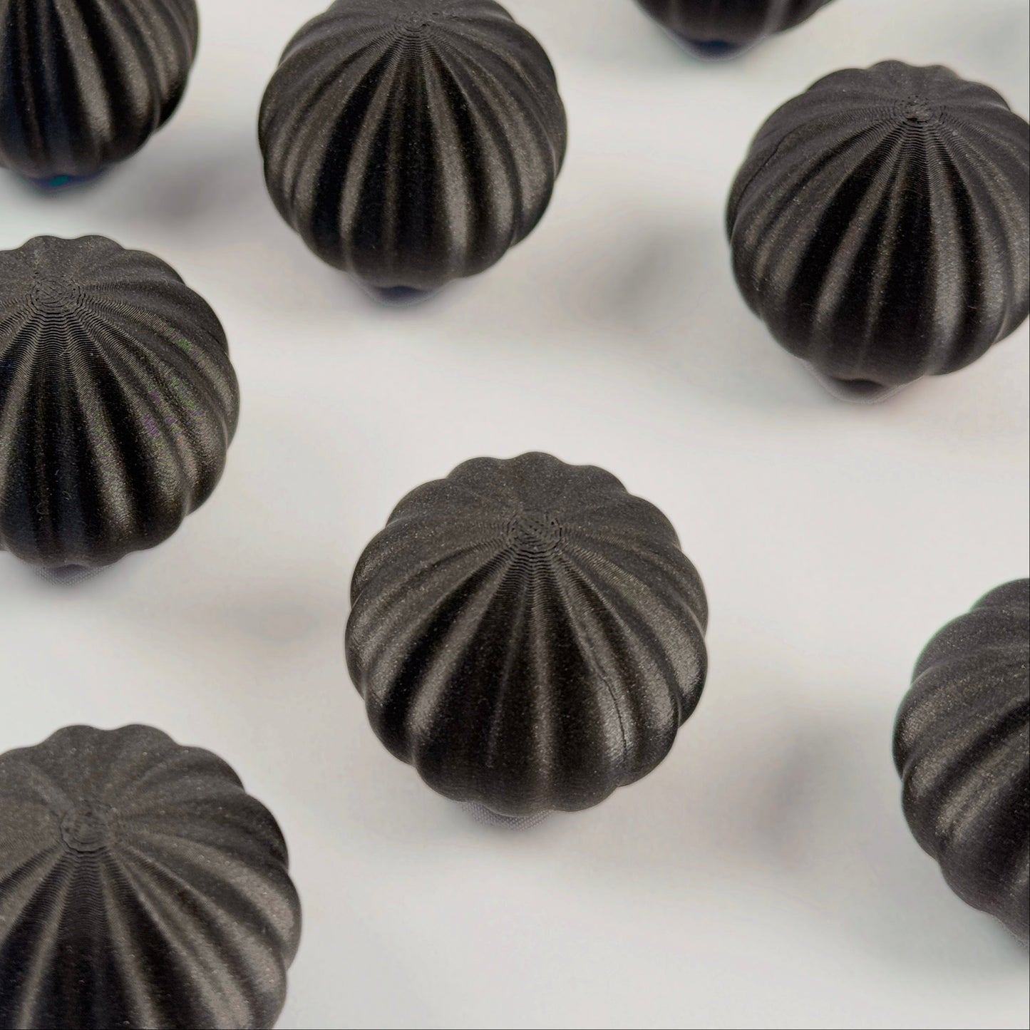Black spherical shaped Christmas ornament 