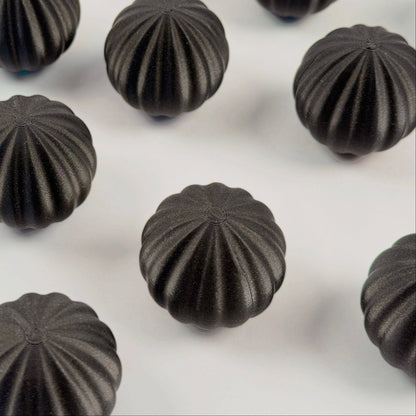 Black spherical shaped Christmas ornament 