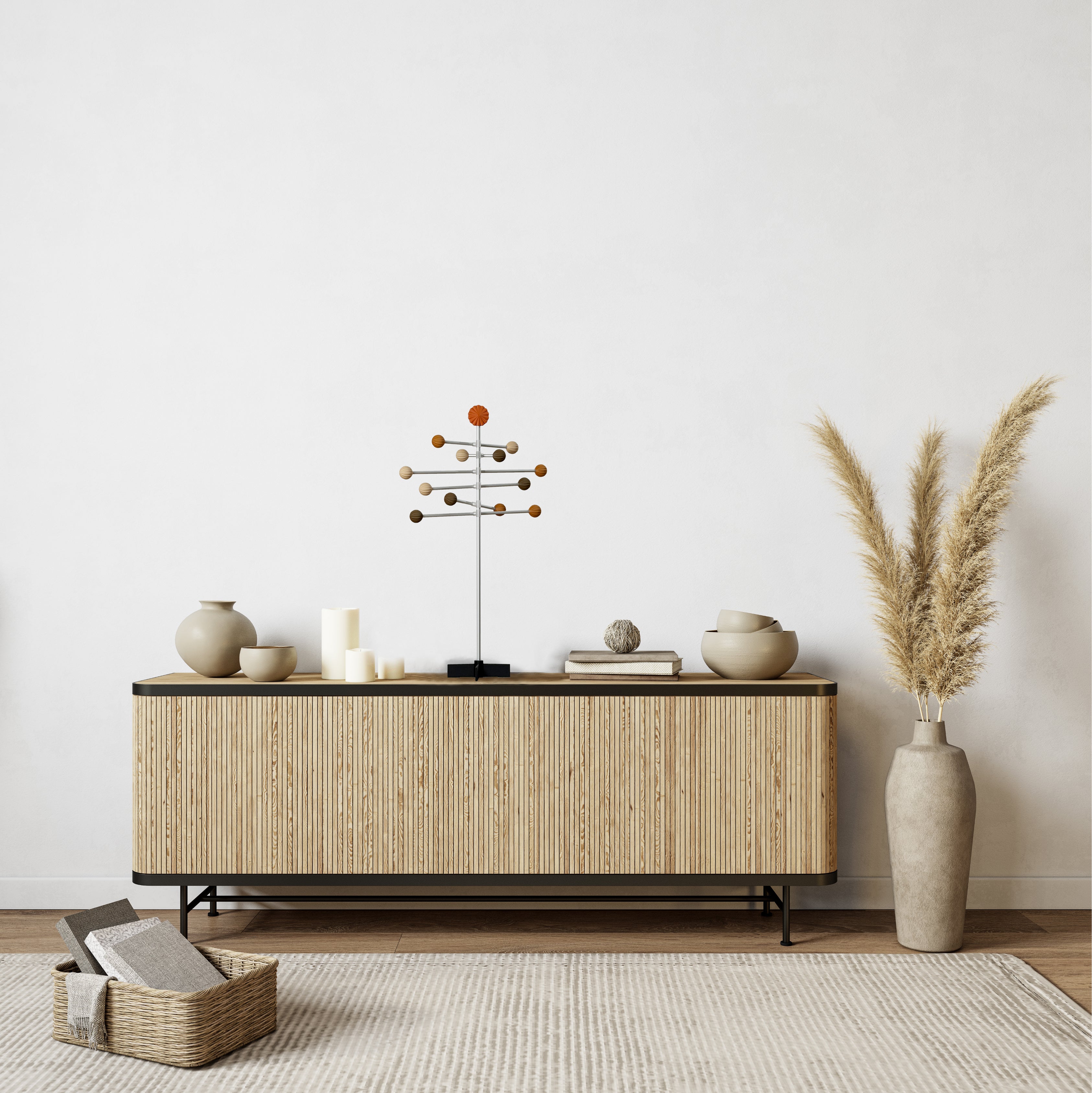 Wooden sideboard with wooden  decorative sculpture in a minimalistic room